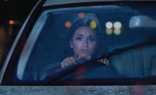 woman driving rain